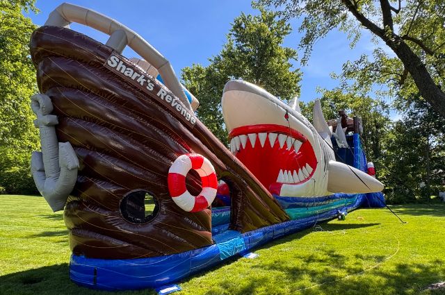 giant-inflatable-water-slide-rental-in-chicago-with-colorful-dual-racing-lanes-for-parties-school-events-and-festivals